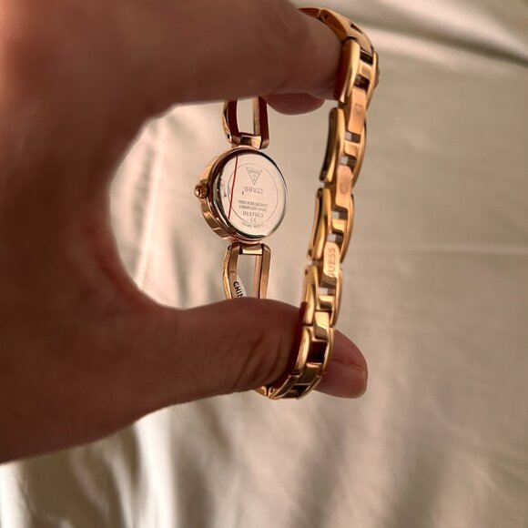 Guess Rose Gold-Tone Cutout Bracelet Analog Watch - Picture 10 of 13